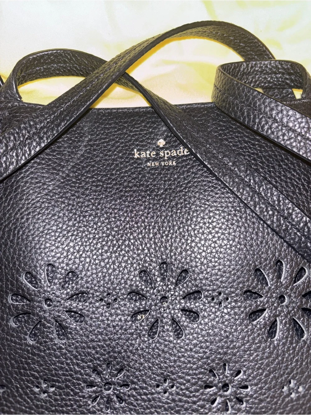 kate spade black leather tote with floral cutouts